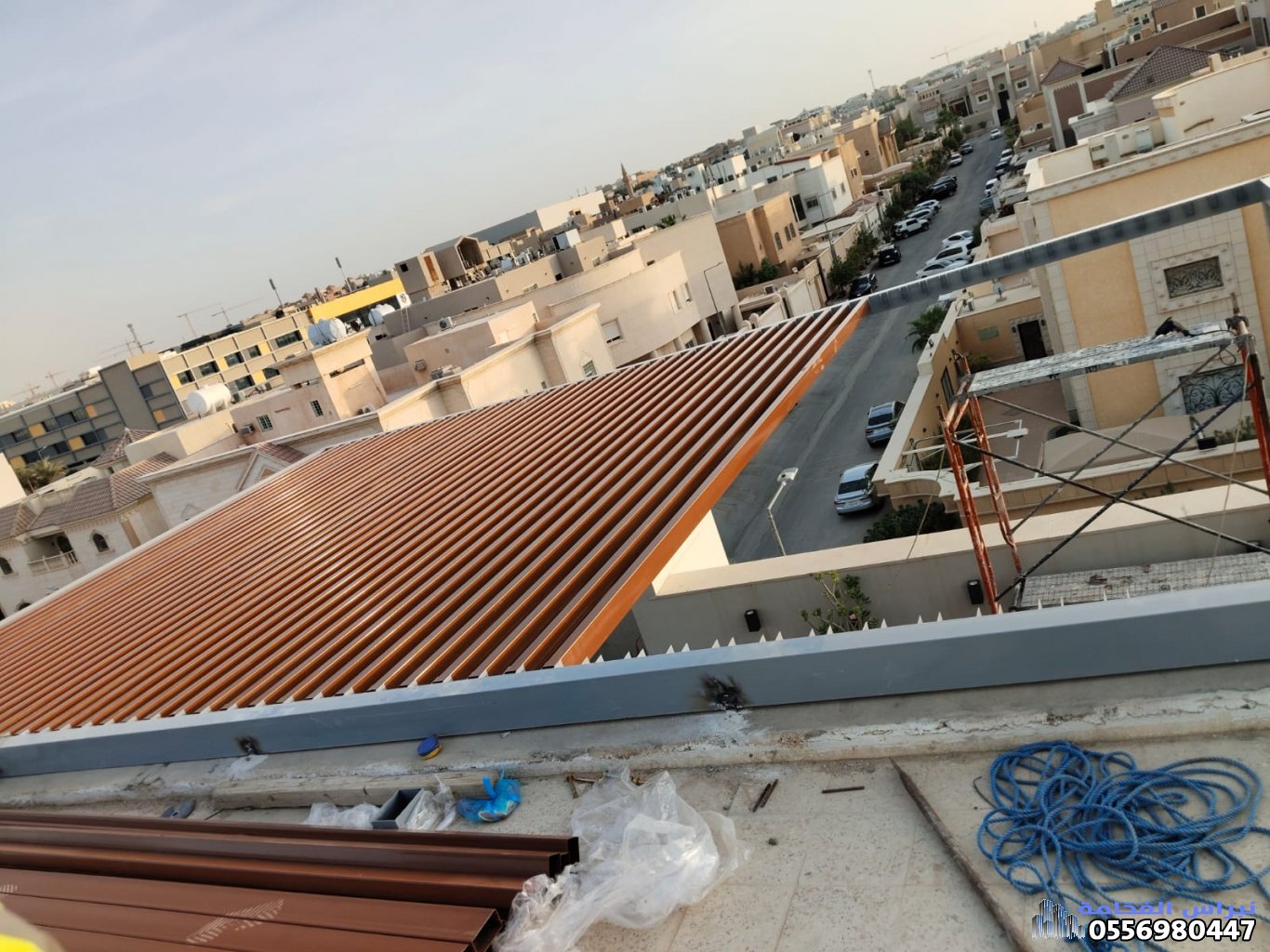 تركيب مظلات حديدية وخشبية متحركة حي الدوحة